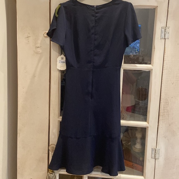 NWT Altar'd State Navy Blue Faux Wrap Dress V
Neck size Medium - Picture 8 of 10